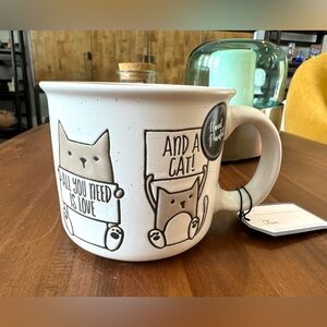 All you need is love and a cat Ceramic Mug